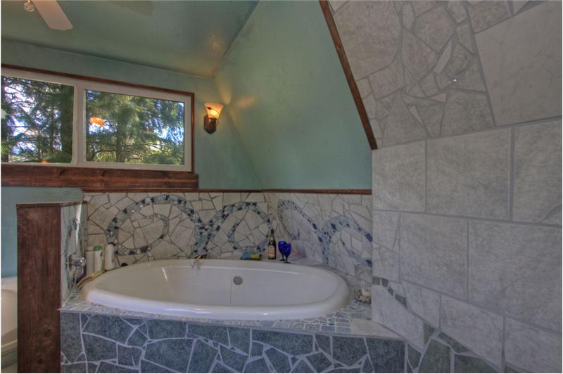 Large soaking tub, with artisan tile work!