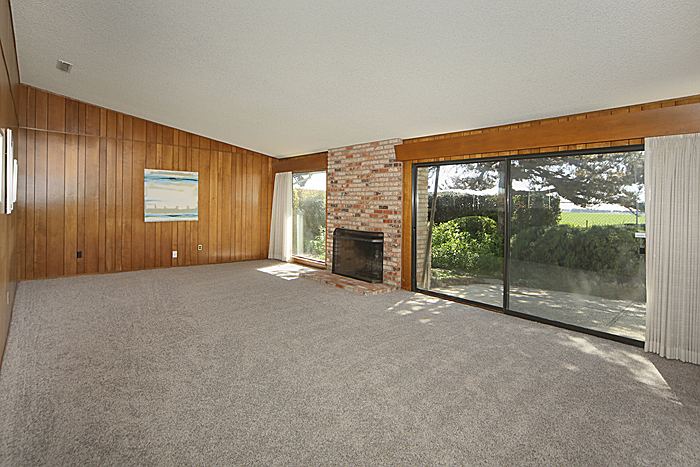 Great room concept with large windows to the farmlands