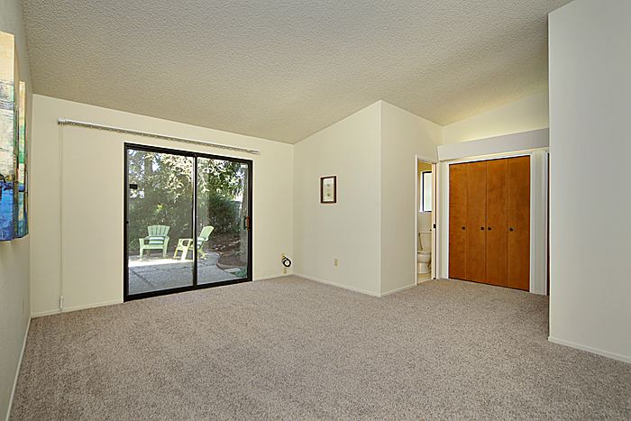 Master bedroom with slider to private courtyard
