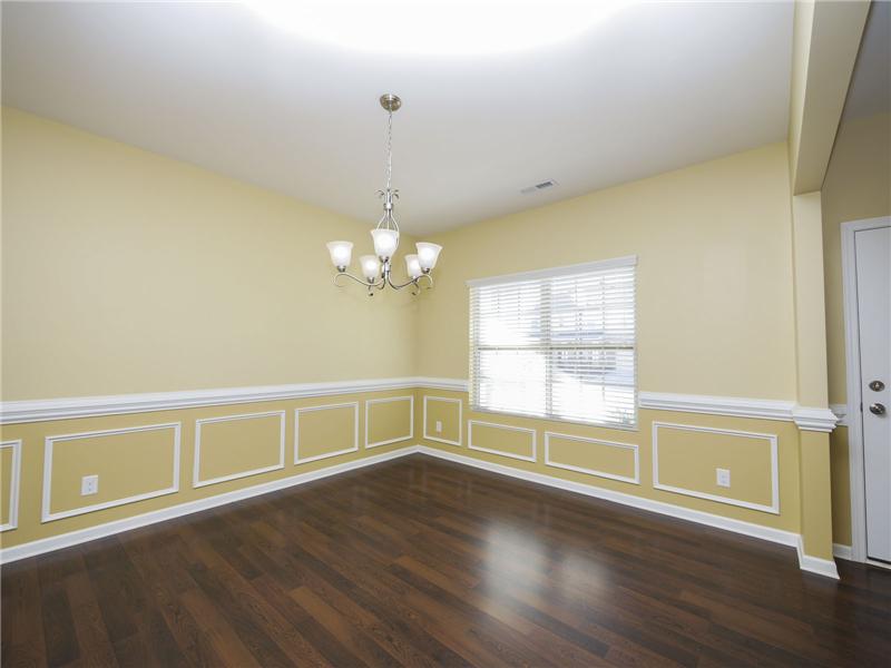 Pretty moldings dress up entry and formal dining room