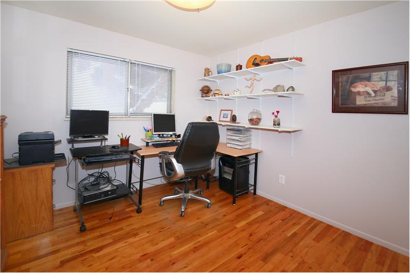 Secondary bedroom on main level is currently being used as an office