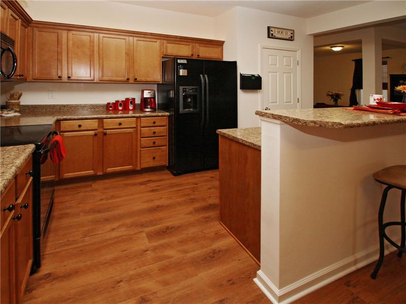 Kitchen is open to the great room and eating areas