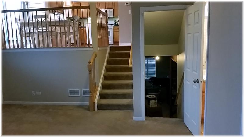 Lower Level Family Room with View towards Stairs that Lead to Kitchen or Sub-basement