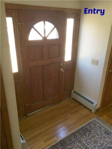 formal entry with 6 panel wood doors