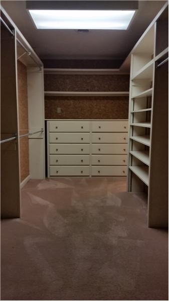 His/Hers Walk-in Closets