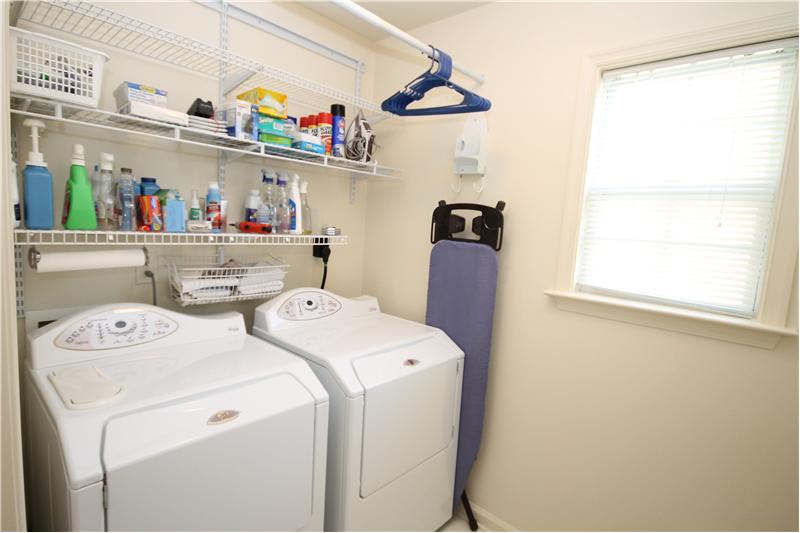 Spacious laundry room with a view