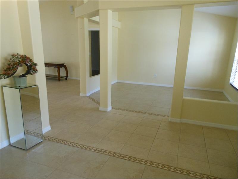 Front Entrance with Den and Formal Dining to the right and left