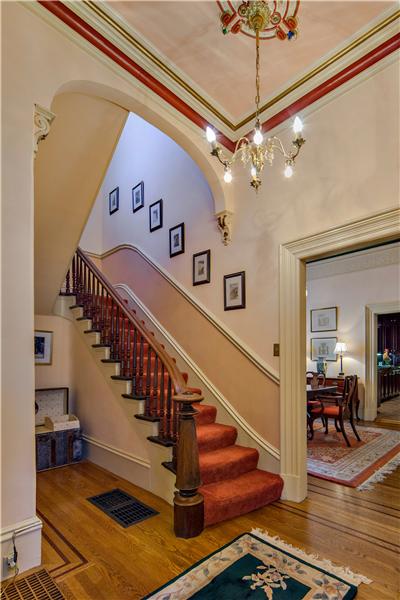 Grand Foyer with 12 Foot Ceilings & Sweeping Staircase