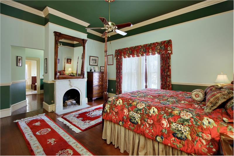 Master Suite features Gas Log Fireplace & Antique Mirror