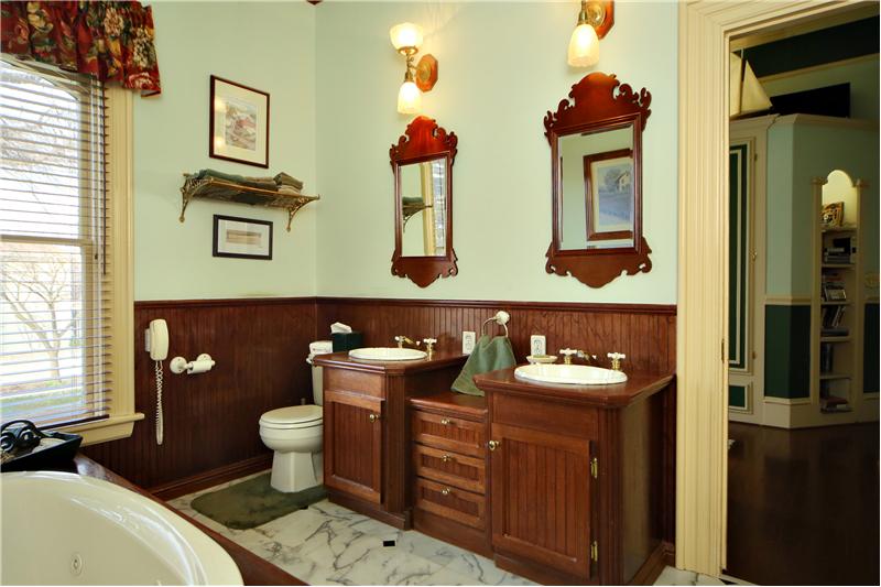 Master Bath features Marble Tiled Floors & Double Vanities