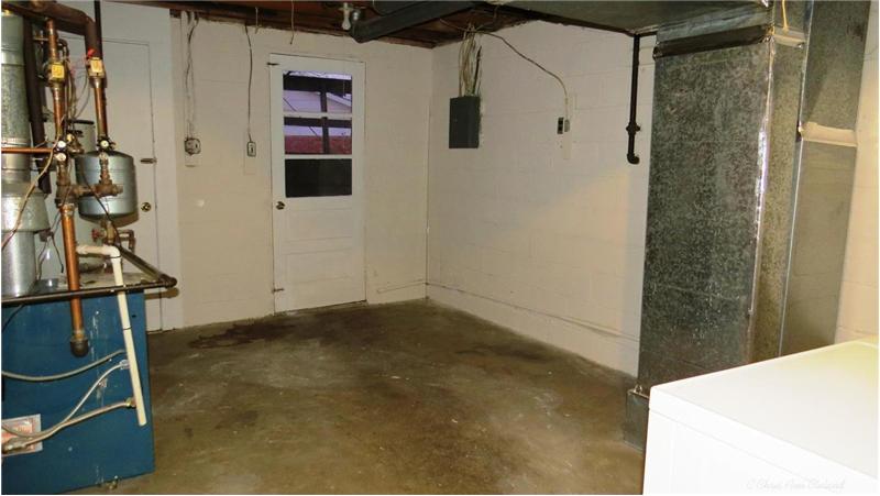 Unfinished Basement Area has a Walk Up Exit
