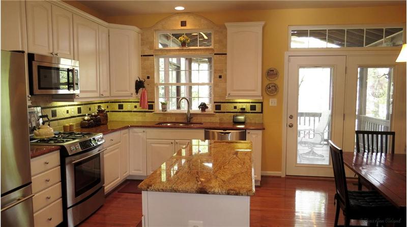 Kitchen has Contrasting Granite Counters/Island