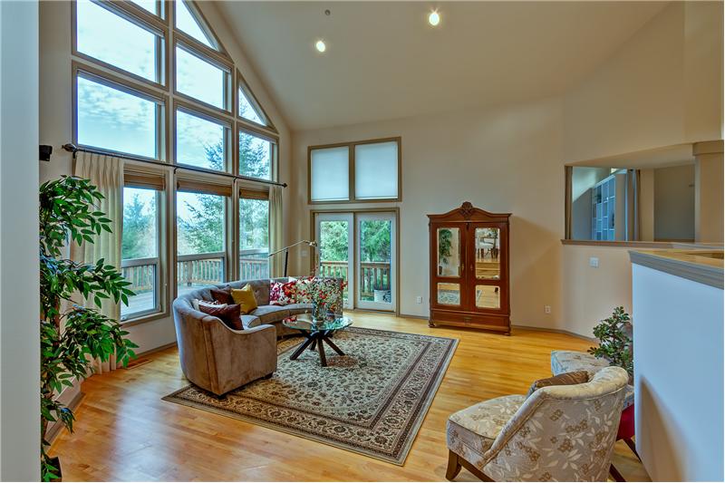 An Abundance of Natural Light and French Doors leading to the Deck.