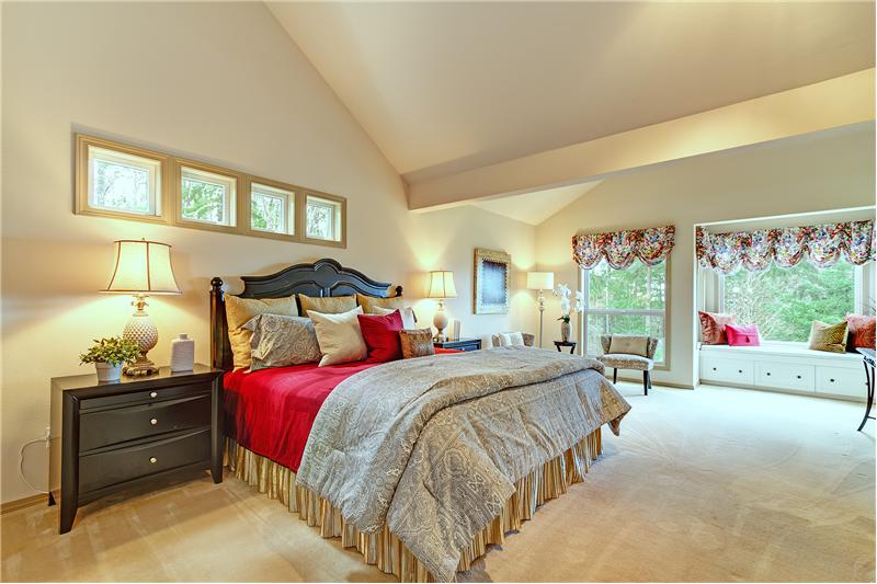 Huge Master Bedroom with Lush Carpet, Views, Viewing Bench and Vaulted Ceilings.