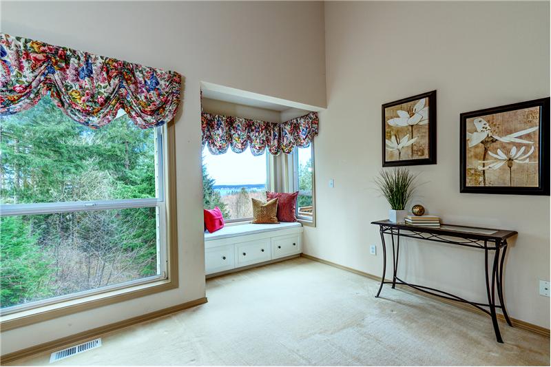 Enjoy the Olympic and Sound Views from this Window Bench Seat in the Master Bedroom.