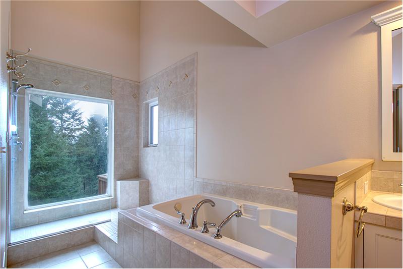 Extensive Use of Tile in this Private Master 5 Piece Bathrm w/Glass Shower, Views and Tile Surround Soaking Tub